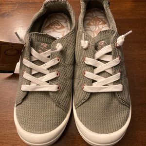 Roxy slip on tennis shoe size 8.5.  New with tags